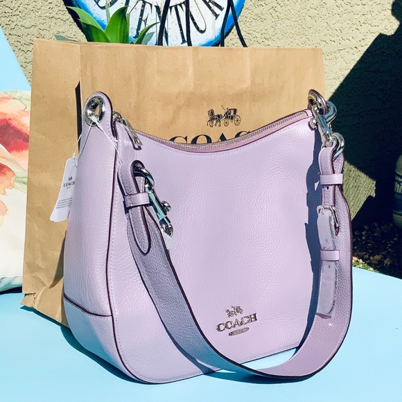 Coach Handbags - Coach lilac wide strap leather shoulder Bag